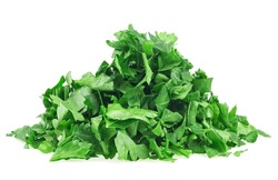 Pile of fresh chopped green parsley leaves isolated on a white background