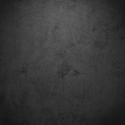 Grunge black/gray plaster or concrete texture or background.