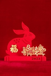 Chinese New Year of Rabbit mascot paper cut on red background the Chinese words means fortune and happy Chinese New Year no logo no trademark
