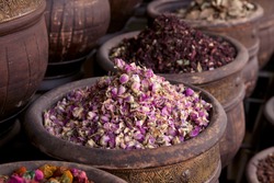 dried herbs flowers (rose) in the  Marrakesh street shop, shallow dof