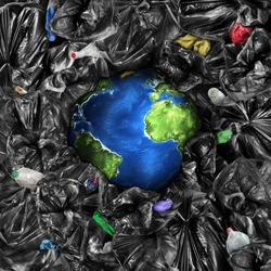 Eco concept. The planet is drowning in the garbage. Recycling. Save the planet.