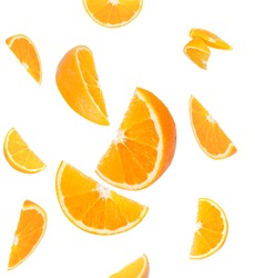 Falling orange and orange slices. Isolated on a white background.