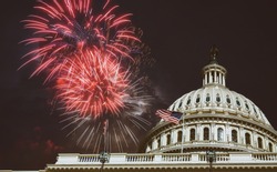 Independence Day Fireworks over Capitol Building at night in Washington, D.C july 4th