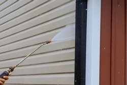 Service for cleaning siding houses on regular basis by using high pressure nozzles that spray soap water