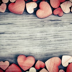 background with wooden  hearts, place for text