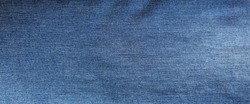 Close-up of blue denim jeans fabric texture background