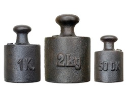 old and rusty weights on white background