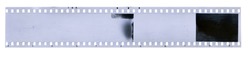 Strip of old celluloid film on white background