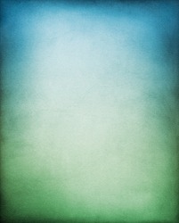 A paper background with a blue to green gradation.