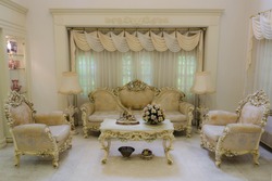 A grand living room interior architecture with various furniture in a residential house home with a luxurious and classical retro of European royal palace style. 
