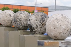 Atlas Stones on their podiums at a Strongman Contest  (NOTE: This is NOT artwork)