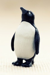 Plastic toy figurine - funny penguin standing.
