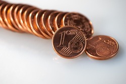 Stack of One Euro Cent Coins Lies on a Gray Background. Web Banner.