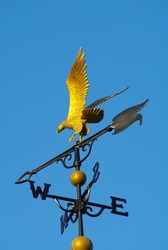 Gold Eagle Weathercock on rooftop