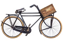 Vintage black cargo bicycle with old wooden transport crate and leather saddle