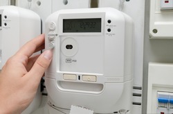 Electric energy meter. Electrical technician servicing unit