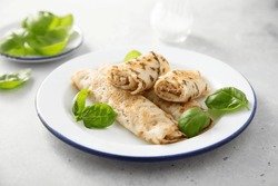 Savory crepes with cheese and ham