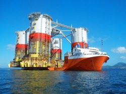 Heavy lift cargo ship transporting an oil rig