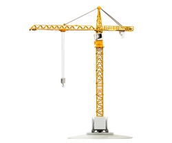 scale model of yellow tower crane isolated on white background