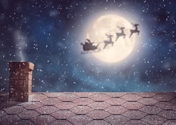 Merry Christmas and happy holidays! Santa Claus flying in his sleigh on background moon sky. Christmas story concept. 
