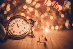 New year clock  on abstract background