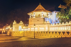 Night view of the Temple of the Buddha Tooth with lights. Kandy, Sri Lanka, Asia.