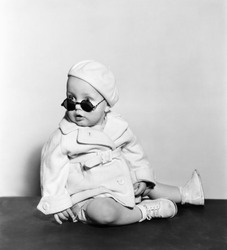 Baby wearing beret and sunglasses