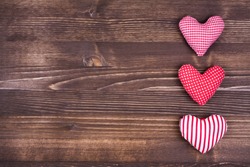 Love hearts on vintage wooden background