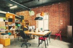Modern office Interior with old vintage brick Wall. Art work business space