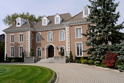 large house with circular driveway