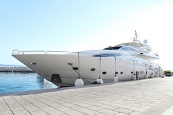 luxury yacht parked at dock