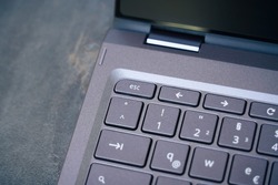 An image of the ESC key on a notebook keyboard
