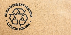 Recycle be environment friendly symbol on cardboard.