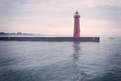 Lighthouse on Lake Michigan on a foggy day