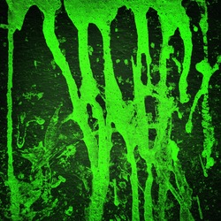 Green color splash on black background, Grunge background.