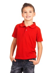 Young pretty boy posing at studio as a fashion model. Photo of preschooler 8 years old over white background