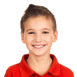 Photo of adorable young happy boy looking at camera.
