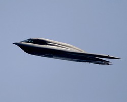 A close up view of a B2 stealth bomber in flight.