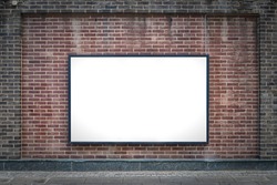 one blank billboard attached to a buildings exterior brick wall.