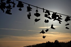 Shoes Hanging from Wire