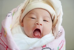 Newborn baby asian girl , 1 day old, Asian eyes, Small eyes
