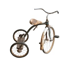 old rusty tricycle on a white background