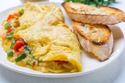 Delicious Egg Omelette with Vegetables on the Plate