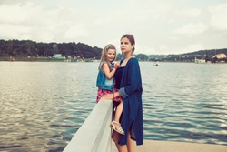 Mother and daughter enjoying at Xuan Huong Lake, Dalat, Vietnam