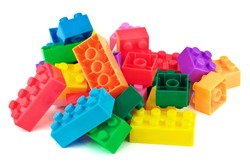 Toy colorful plastic blocks isolated on white background 