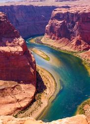Colorado River cuts through rock at Horseshoe Bend heading for Grand Canyon