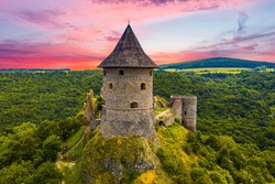 Ruins of a medieval castle Somoska on borders of Slovakia and Hungary at sunset time. Southern Slovakia