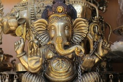 Bronze figure of the Hindu god Ganesha with the head of an elephant.