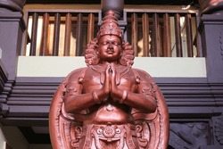 Bronze statue of Garuda near the temple in Udupi, India.