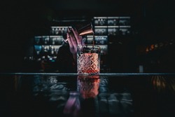 woman hand bartender making cocktail in bar